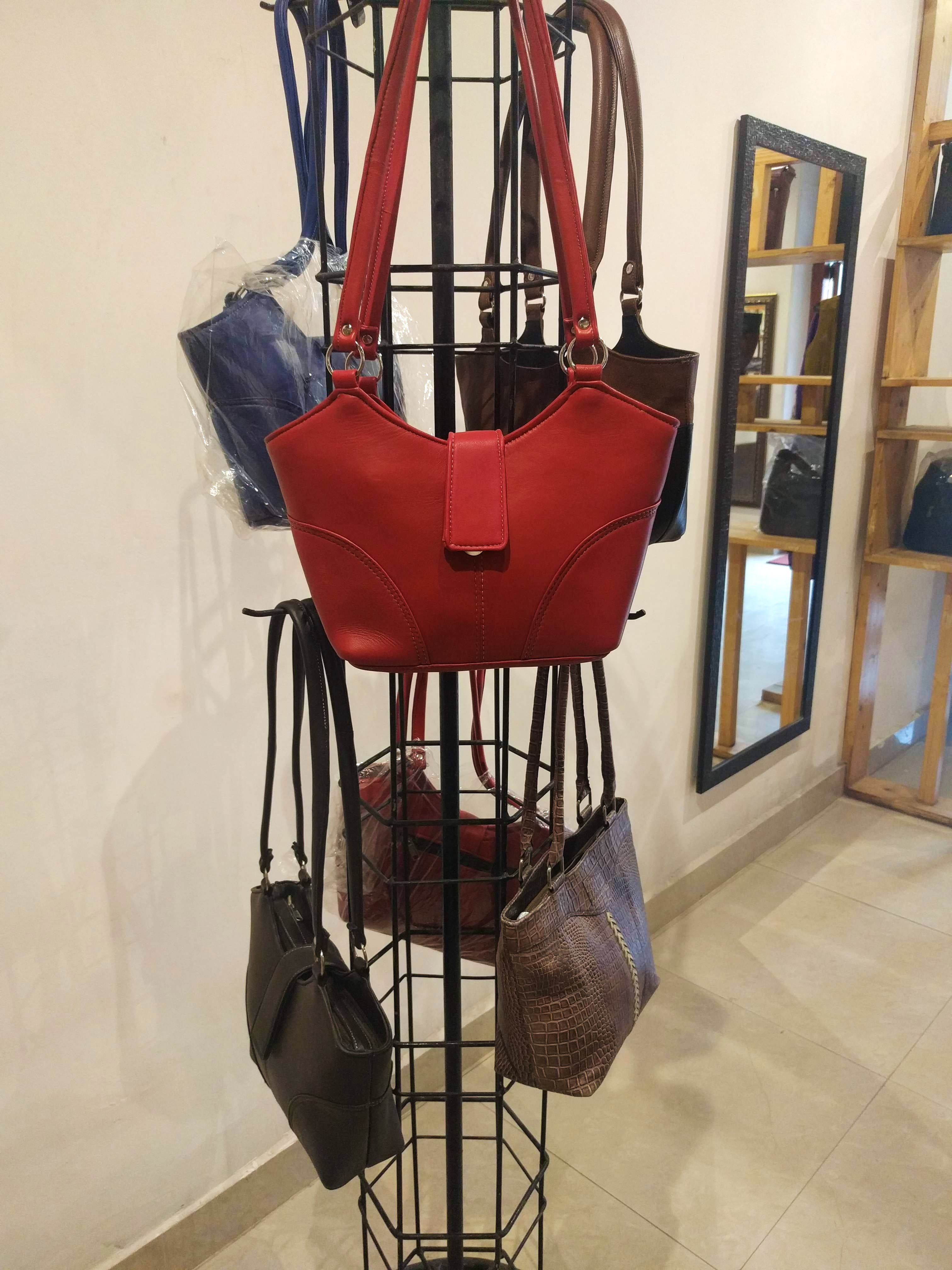 Iron,Handbag,Bag,Fashion accessory,Furniture,Metal