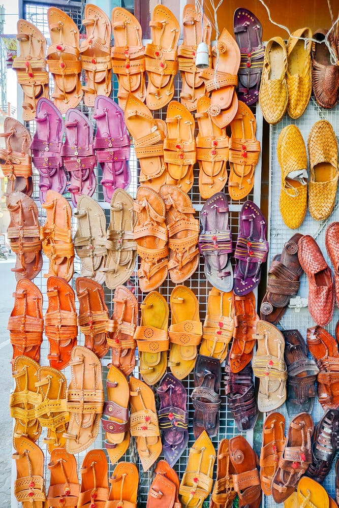 Footwear,Orange,Shoe,Art,Junk food,Confectionery,Slipper,Sandal,Pattern,Visual arts