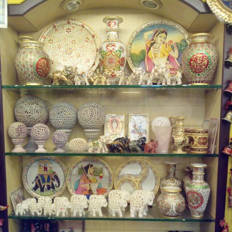 Shelf,Display case,Collection,Antique,Ceramic,Shrine,Porcelain,Souvenir,Shelving,Art