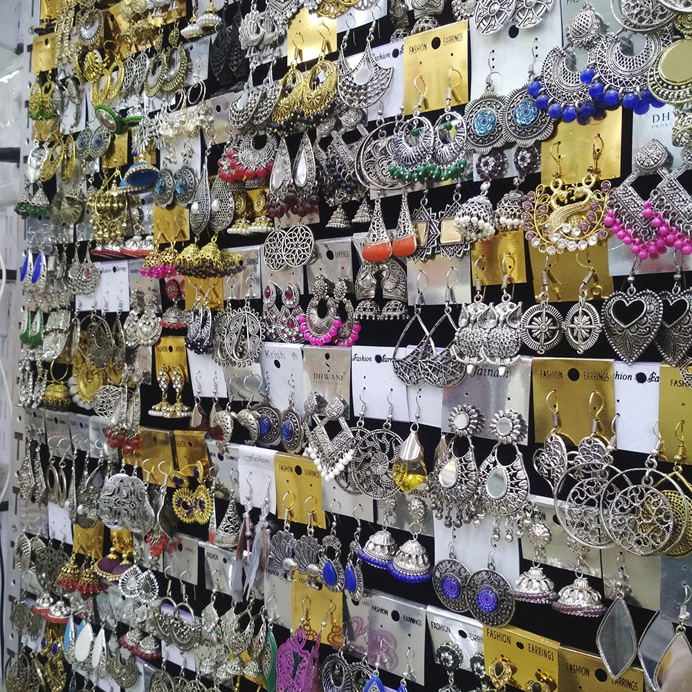 Wall,Footwear,Fashion accessory,Collection,Photography,Metal