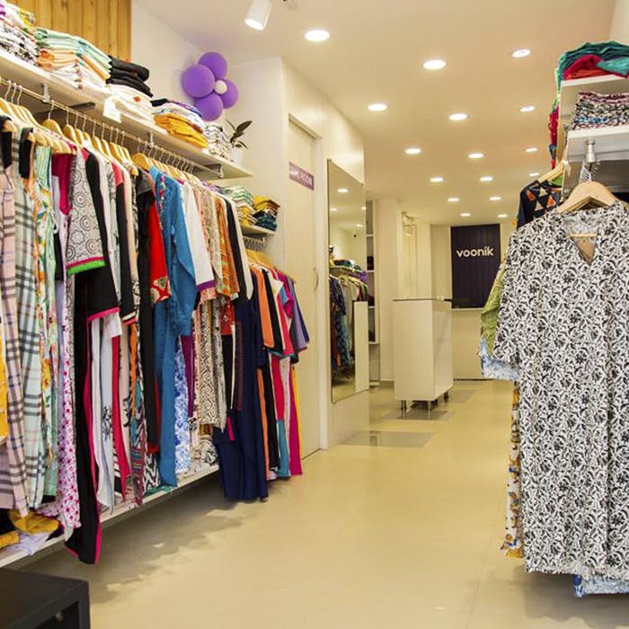 Boutique,Clothing,Outlet store,Room,Clothes hanger,Retail,Closet,Fashion,Building,Outerwear