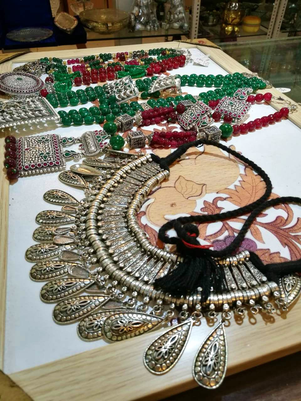 Fashion accessory,Table,Hand fan,Jewellery,Games,Ornament