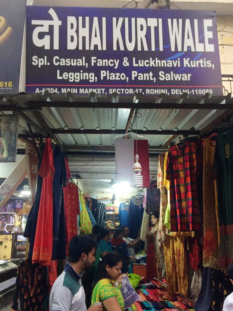 Public space,Bazaar,Market,Human settlement,Selling,Building,Textile,Outlet store,Marketplace,City