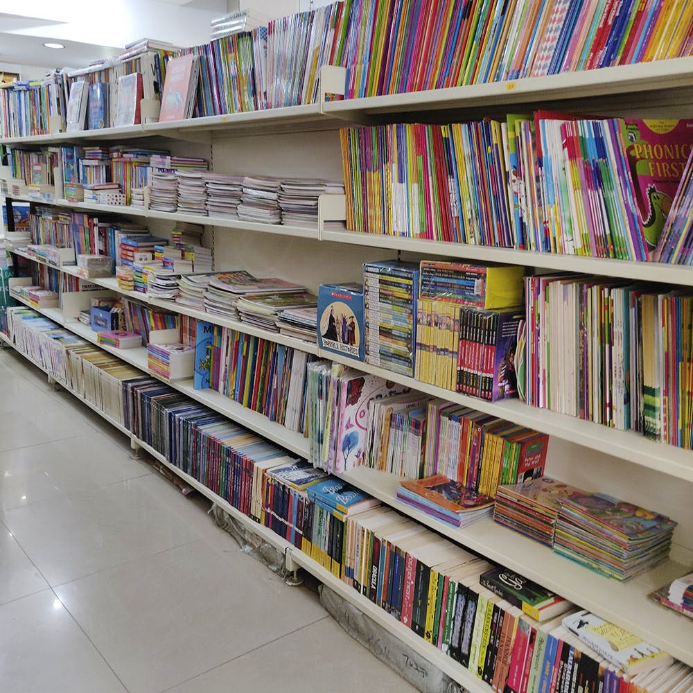 Library,Shelving,Shelf,Bookcase,Public library,Bookselling,Book,Publication,Furniture,Building