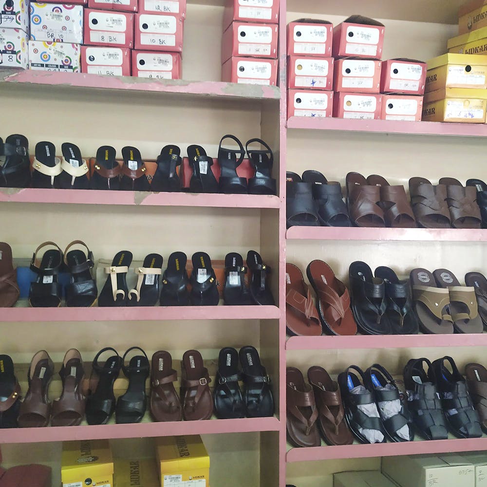 Footwear,Shelf,Collection,Shoe,Room,Athletic shoe,Furniture,Skate shoe,Shoe store,Shoe organizer