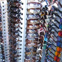 Eyewear,Glasses,Bead,Sunglasses,Fashion accessory,Glass,Vision care,Metal,Collection