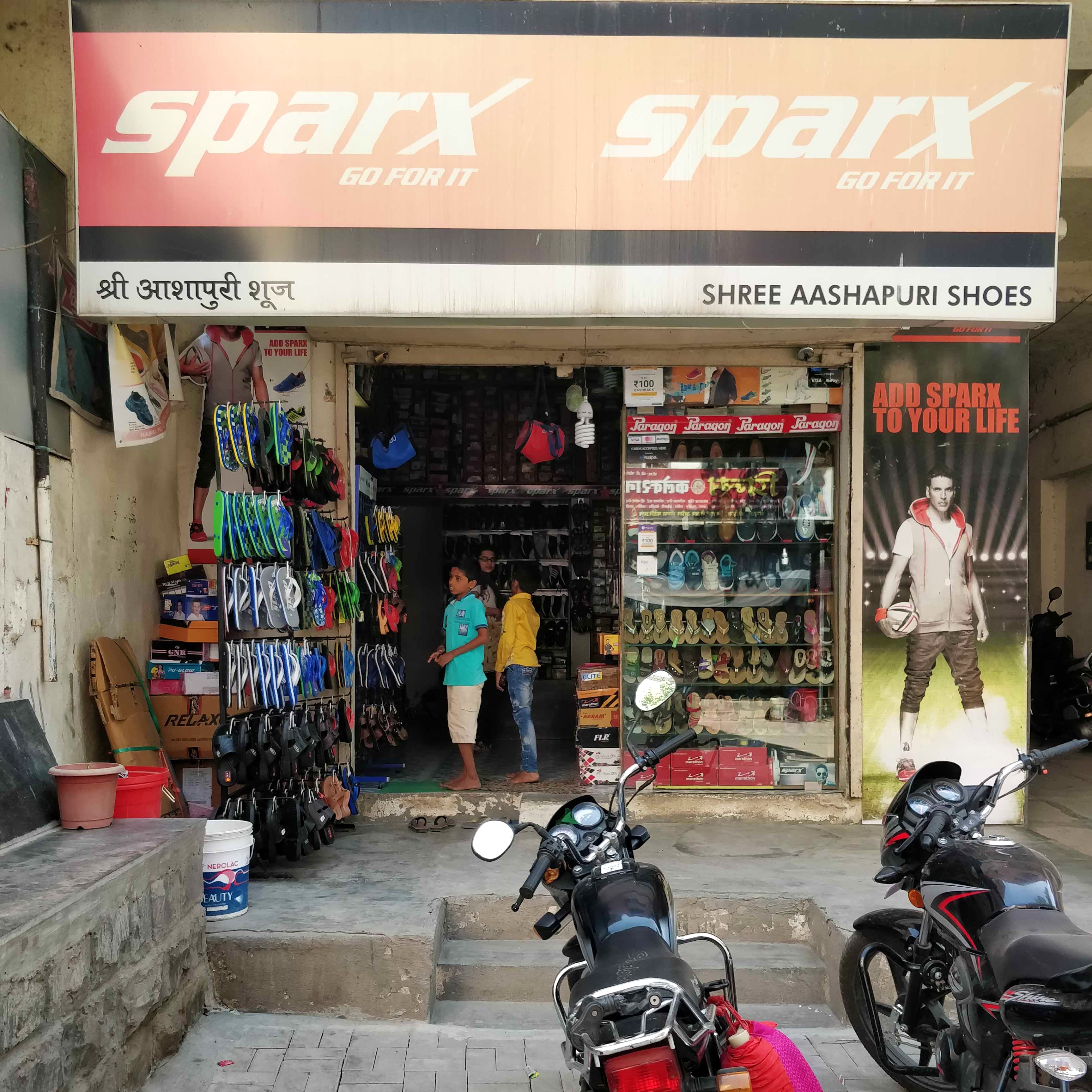 Building,Vehicle,Motorcycle accessories,Outlet store,Retail,Footwear,Motorcycle,Auto part,Convenience store,Shoe