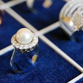 Pearl,Jewellery,Gemstone,Fashion accessory,Earrings,Ear,Ring,Diamond,Silver,Body jewelry