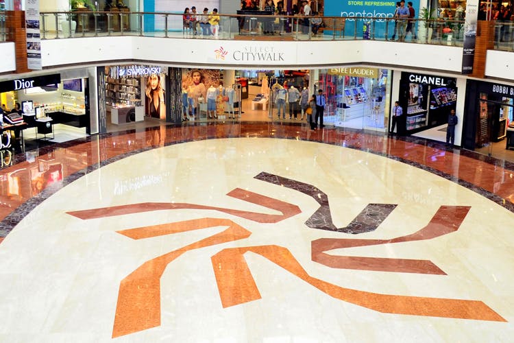 Floor,Shopping mall,Flooring,Building,Retail