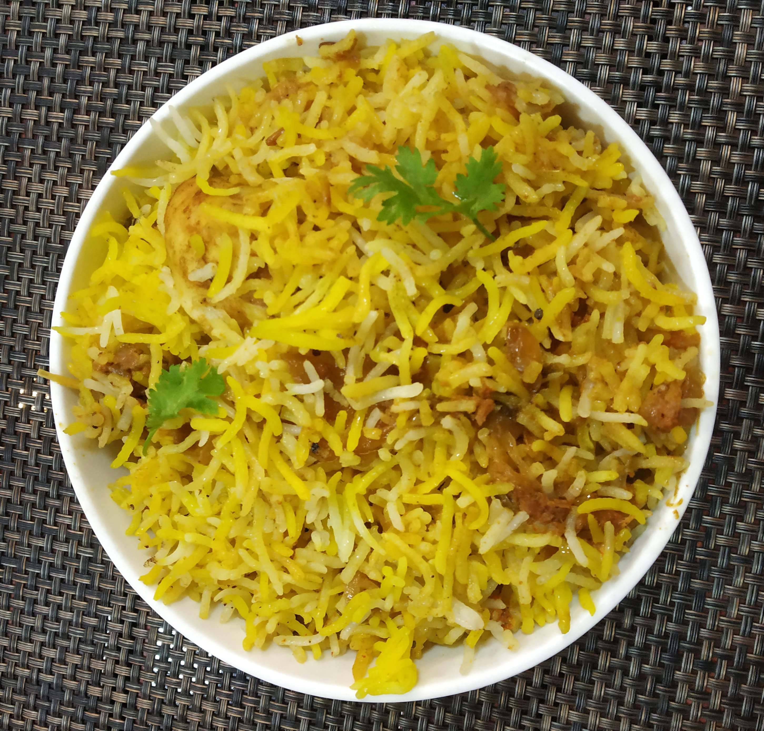 Dish,Food,Spiced rice,Saffron rice,Cuisine,Basmati,Ingredient,Lemon rice,Rice,Hyderabadi biriyani