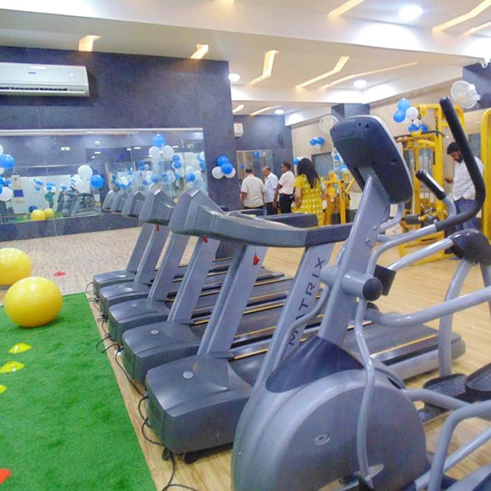 Room,Leisure centre,Yellow,Physical fitness,Exercise equipment,Leisure,Gym,Sport venue,Recreation,Games