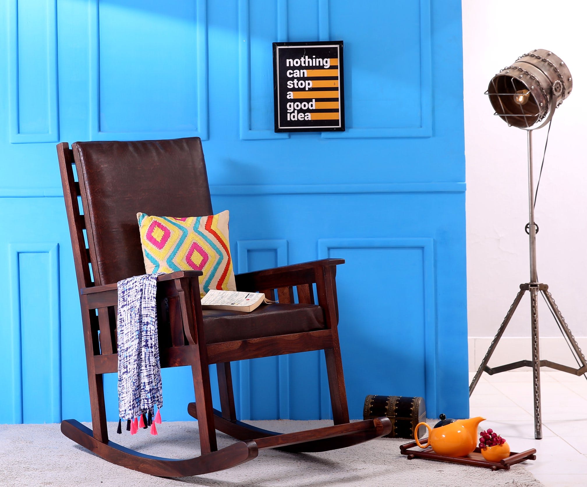 Furniture,Blue,Room,Chair,Rocking chair,Yellow,Orange,Interior design,Lamp,Table