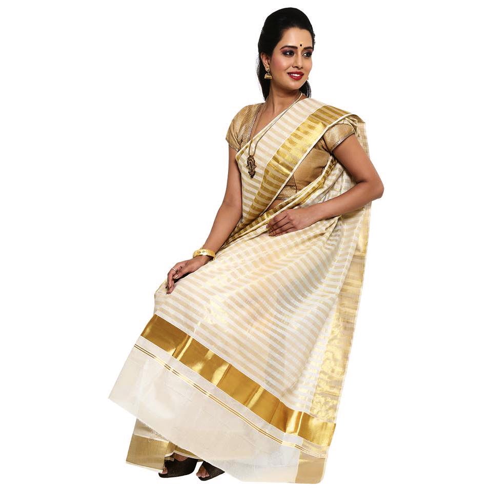 White,Clothing,Sari,Fashion model,Yellow,Beige,Formal wear,Dress,Neck,Embroidery