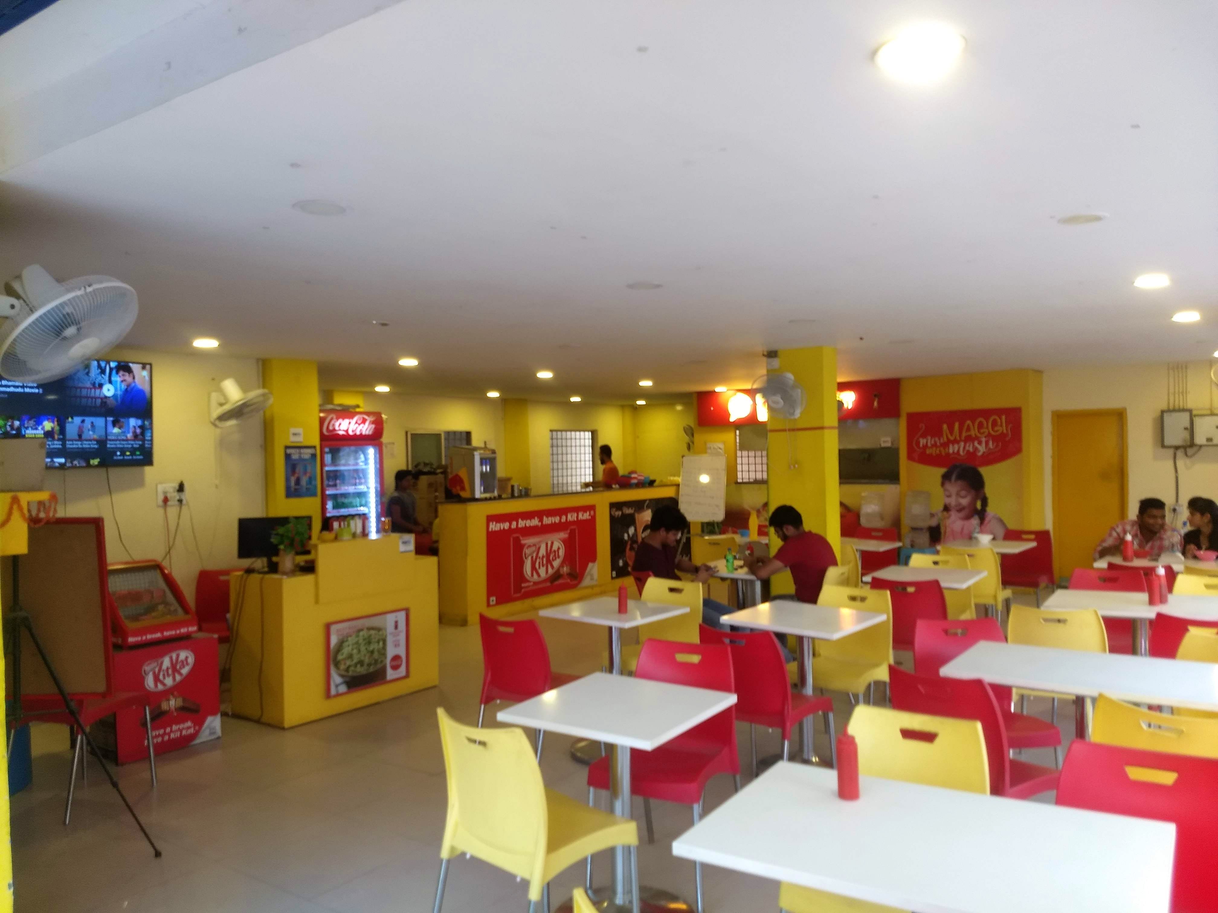 Building,Room,Interior design,Fast food restaurant,Restaurant,Ceiling