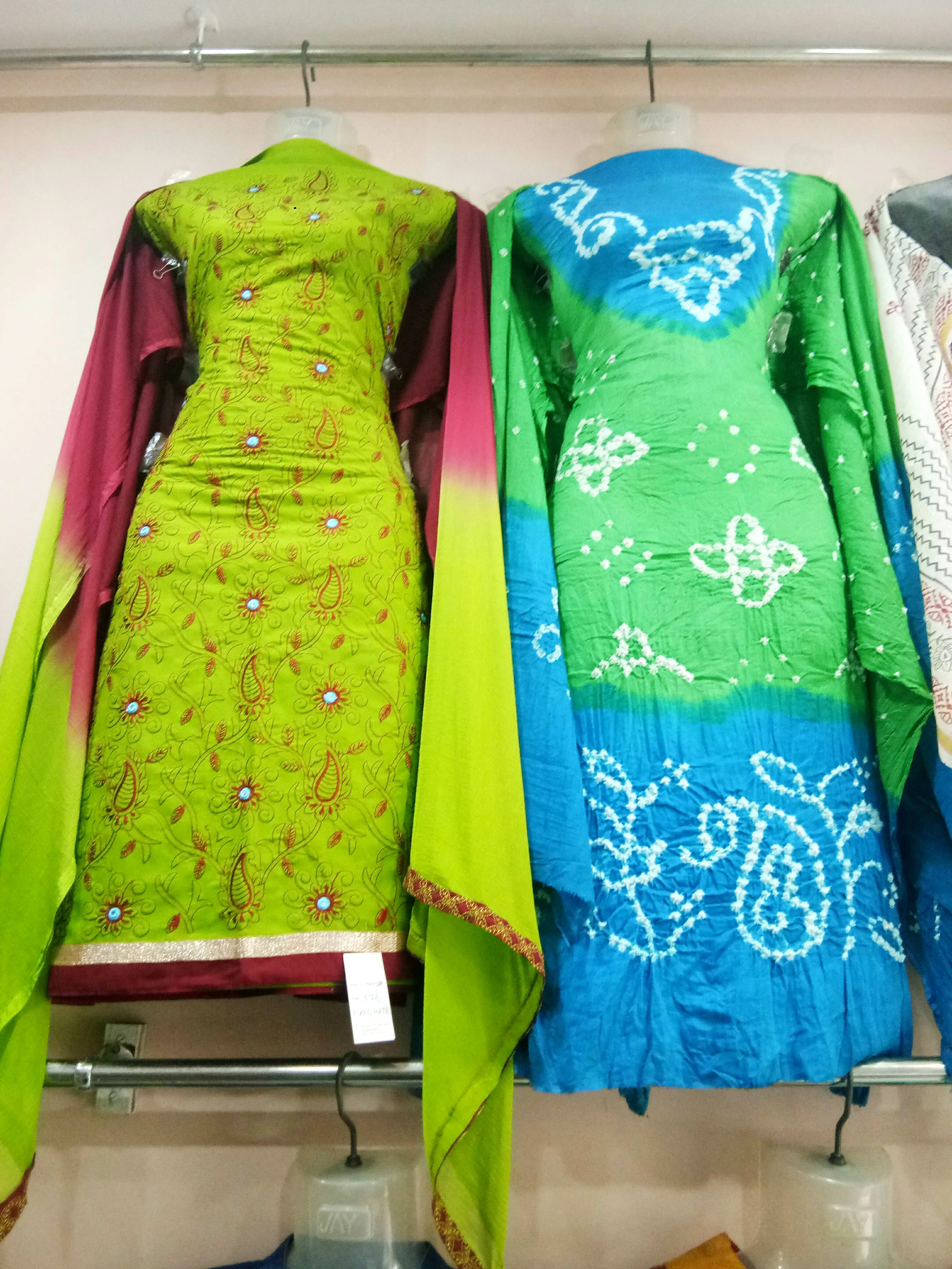 Clothing,Green,Yellow,Outerwear,Textile,Fashion design,Formal wear,Embroidery,Boutique,Dress