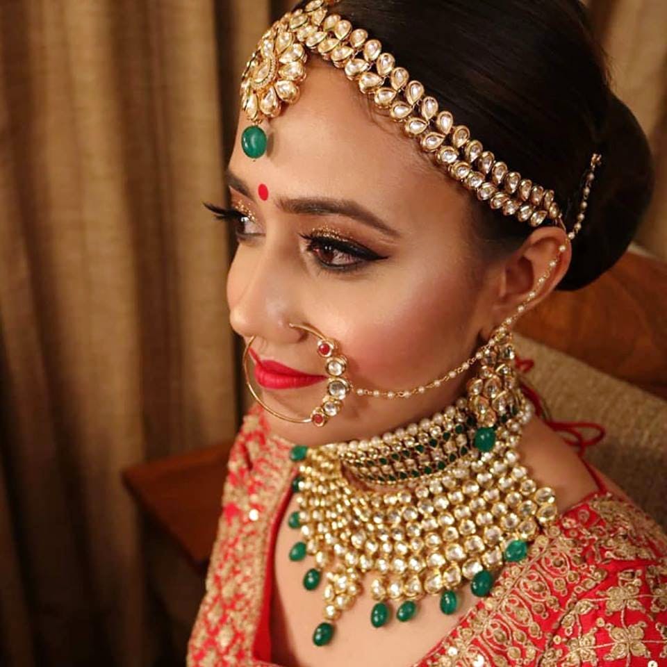 Bride,Jewellery,Beauty,Tradition,Forehead,Fashion accessory,Headpiece,Lip,Makeover,Close-up