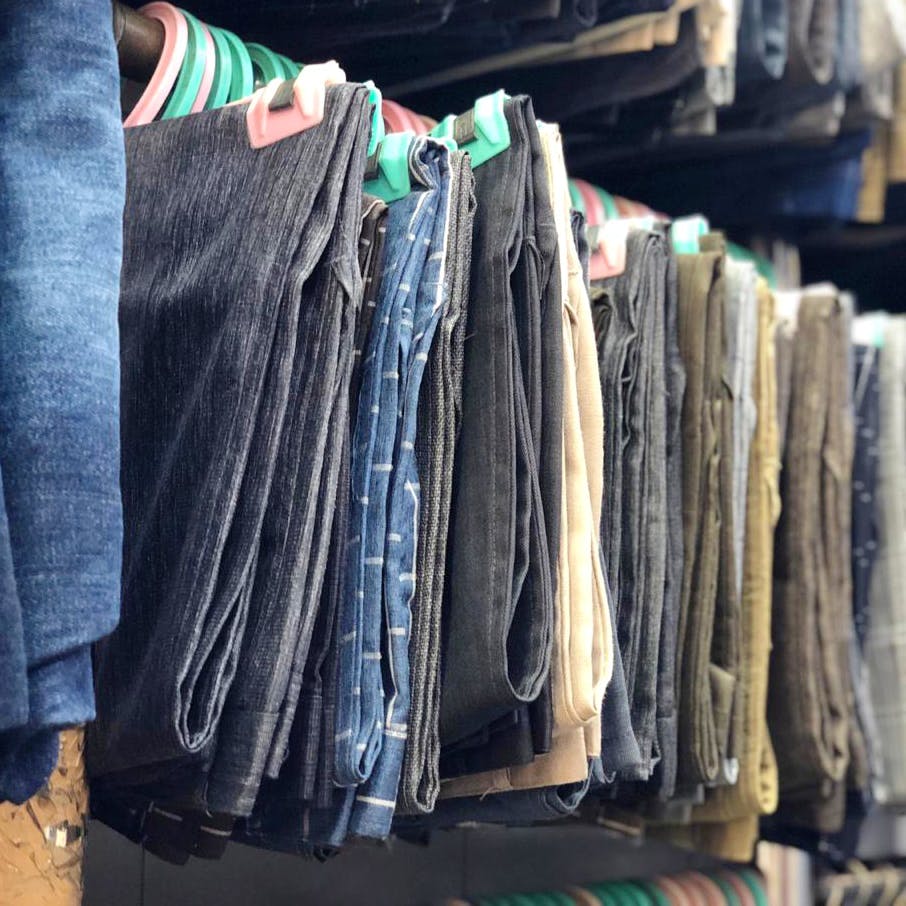 Jeans,Clothing,Denim,Textile,Boutique,Room,Trousers,Wood,Metal