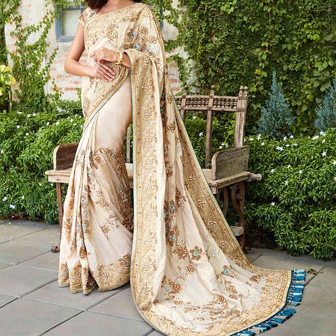 Clothing,Dress,Gown,Formal wear,Sari,Beige,Wedding dress,Peach,Fashion model,Pink