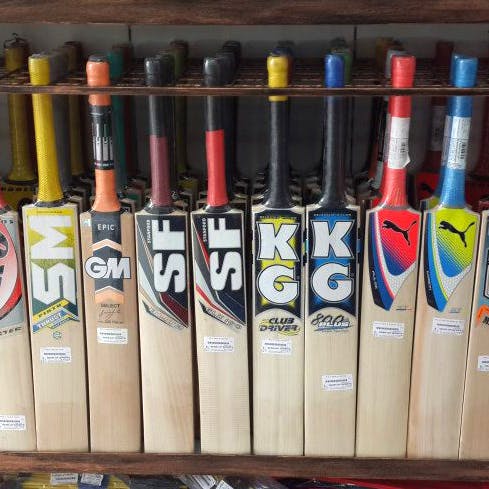 Cricket bat,Liqueur,Sports equipment,Distilled beverage