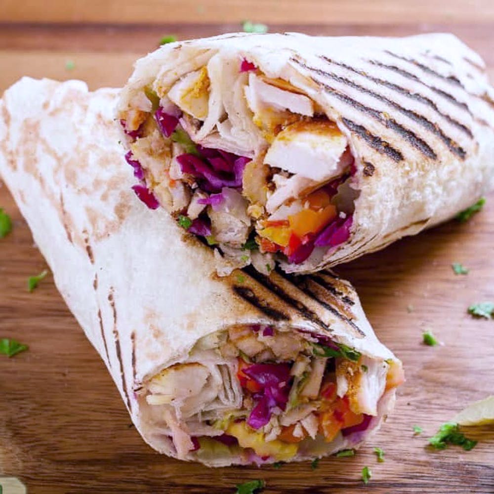 Dish,Food,Cuisine,Sandwich wrap,Ingredient,Wrap roti,Mission burrito,Burrito,Shawarma,Sandwich