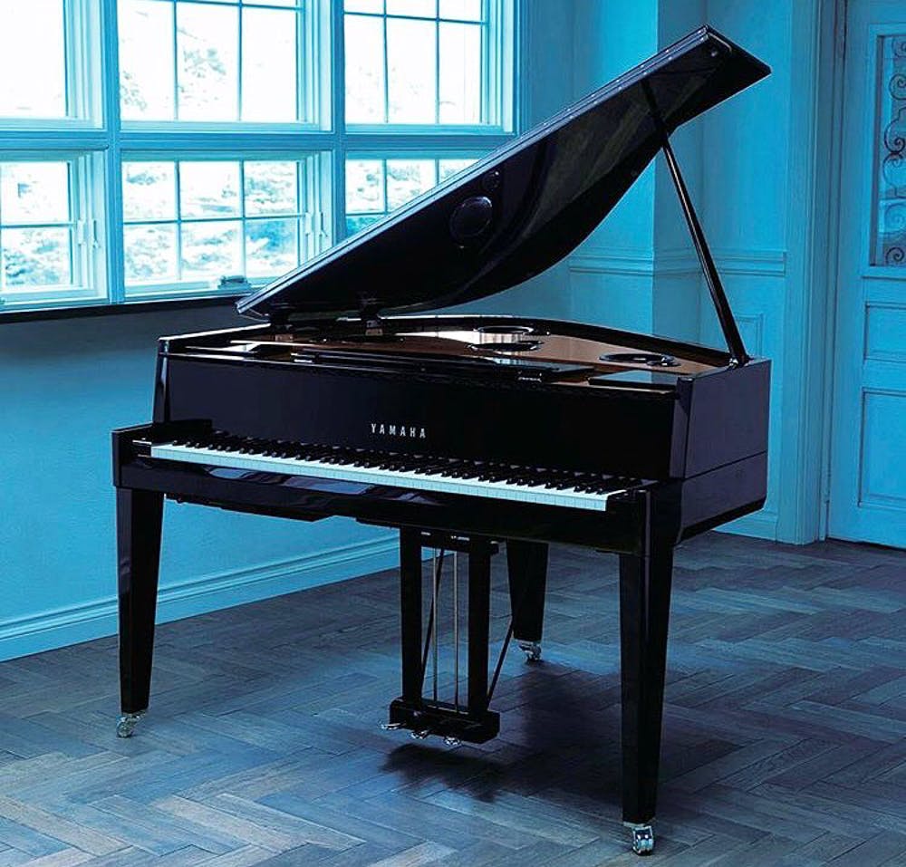 Piano,Fortepiano,Musical instrument,Keyboard,Spinet,Electronic instrument,Musical instrument accessory,Musical keyboard,Technology,Pianist