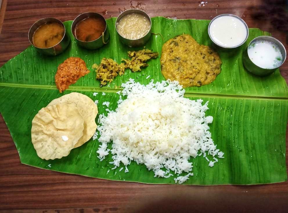 Dish,Food,Cuisine,Sadya,Banana leaf rice,Andhra food,Tamil food,Ingredient,Leaf,Vegetarian food