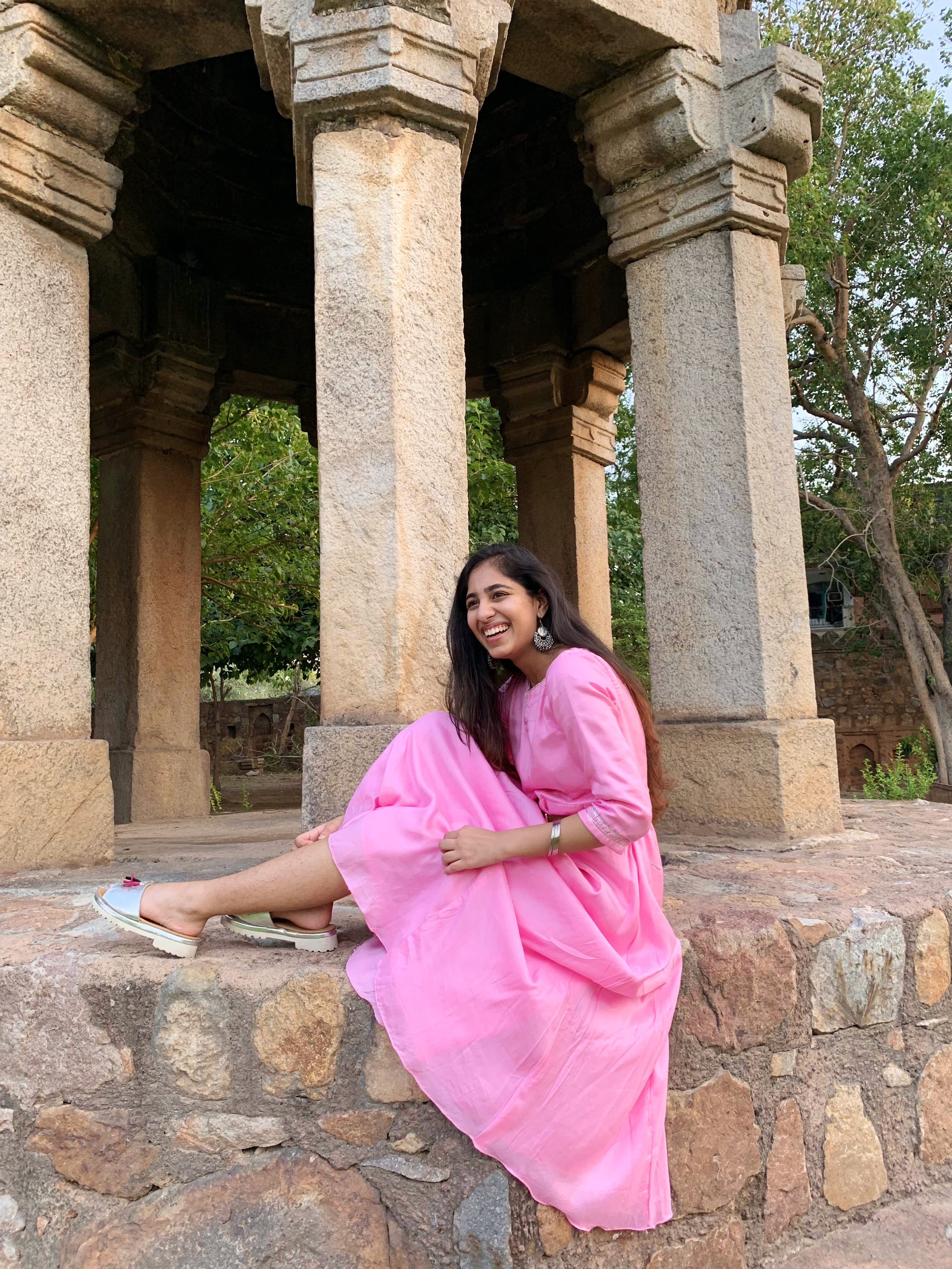 Pink,Arch,Architecture,Temple,Tourism,Vacation,Column,Photography,Historic site,Leisure