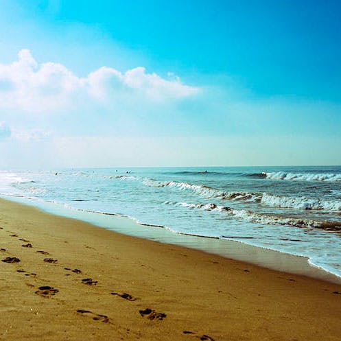 Body of water,Beach,Sky,Sea,Ocean,Shore,Water,Wave,Coast,Sand