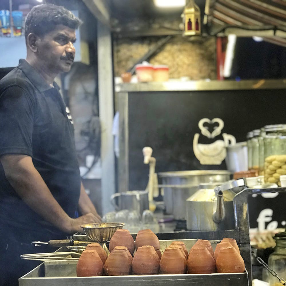 Street food,Food,Local food,Cuisine,Fast food,Dish,Shopkeeper,Cooking