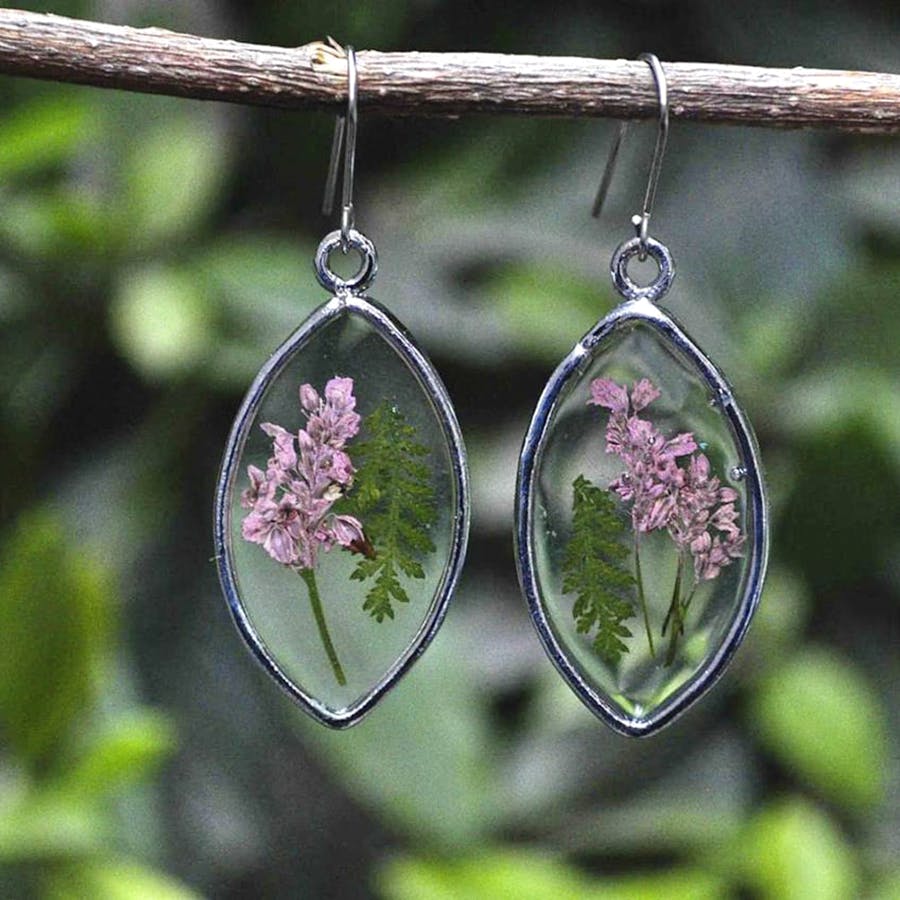 Jewellery,Earrings,Fashion accessory,Pink,Metal,Plant,Flower,Silver