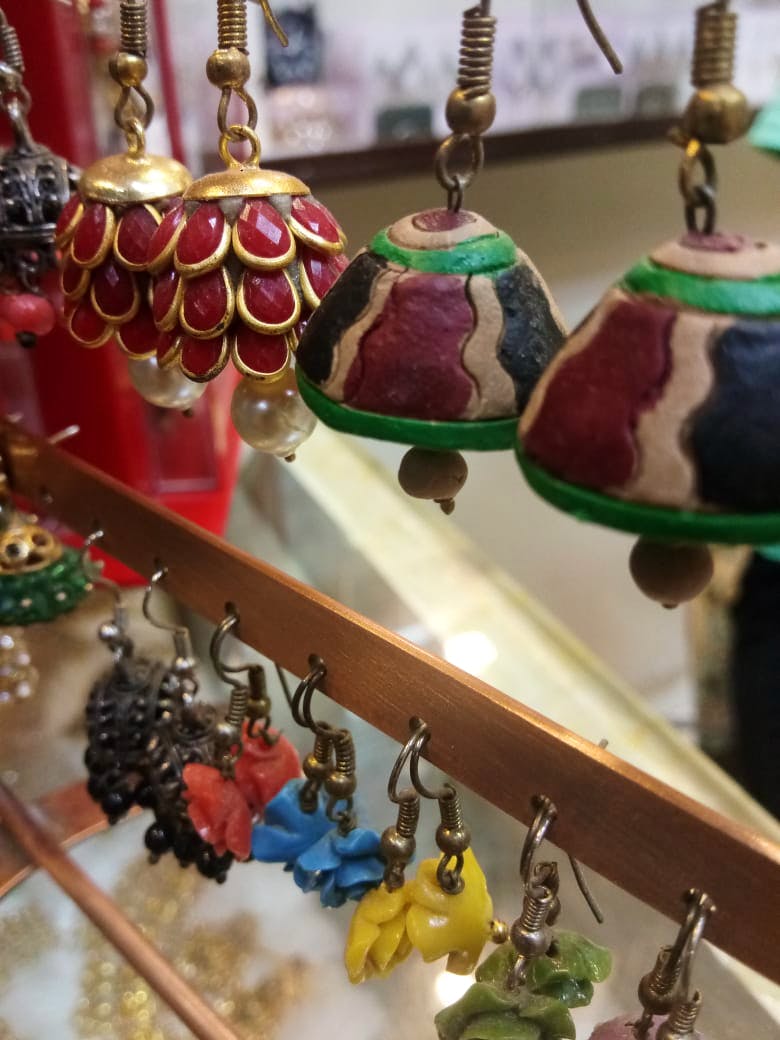 Fashion accessory,Jewellery,Collection,Souvenir,Bell,Market