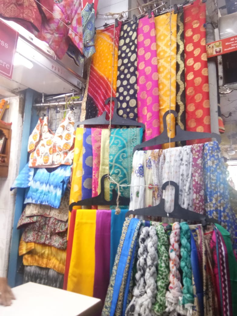 Bazaar,Textile,Market,Public space,Boutique,Outlet store,Selling,Marketplace,Fashion accessory,Thread