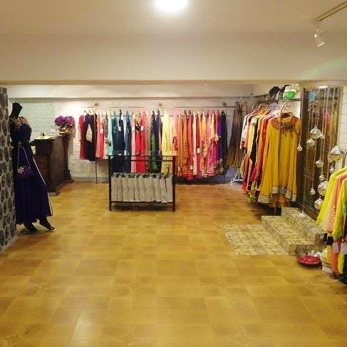 Boutique,Floor,Flooring,Room,Fashion,Outlet store,Retail,Textile,Building,Outerwear