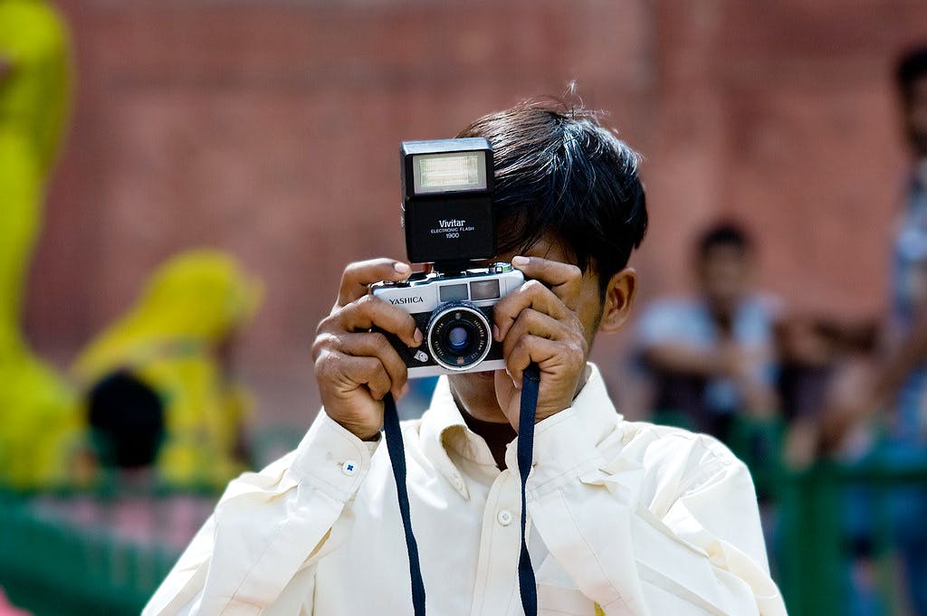Photograph,Photographer,Camera operator,Cameras & optics,Photography,Camera,Human,Camera lens,Digital camera,Videographer