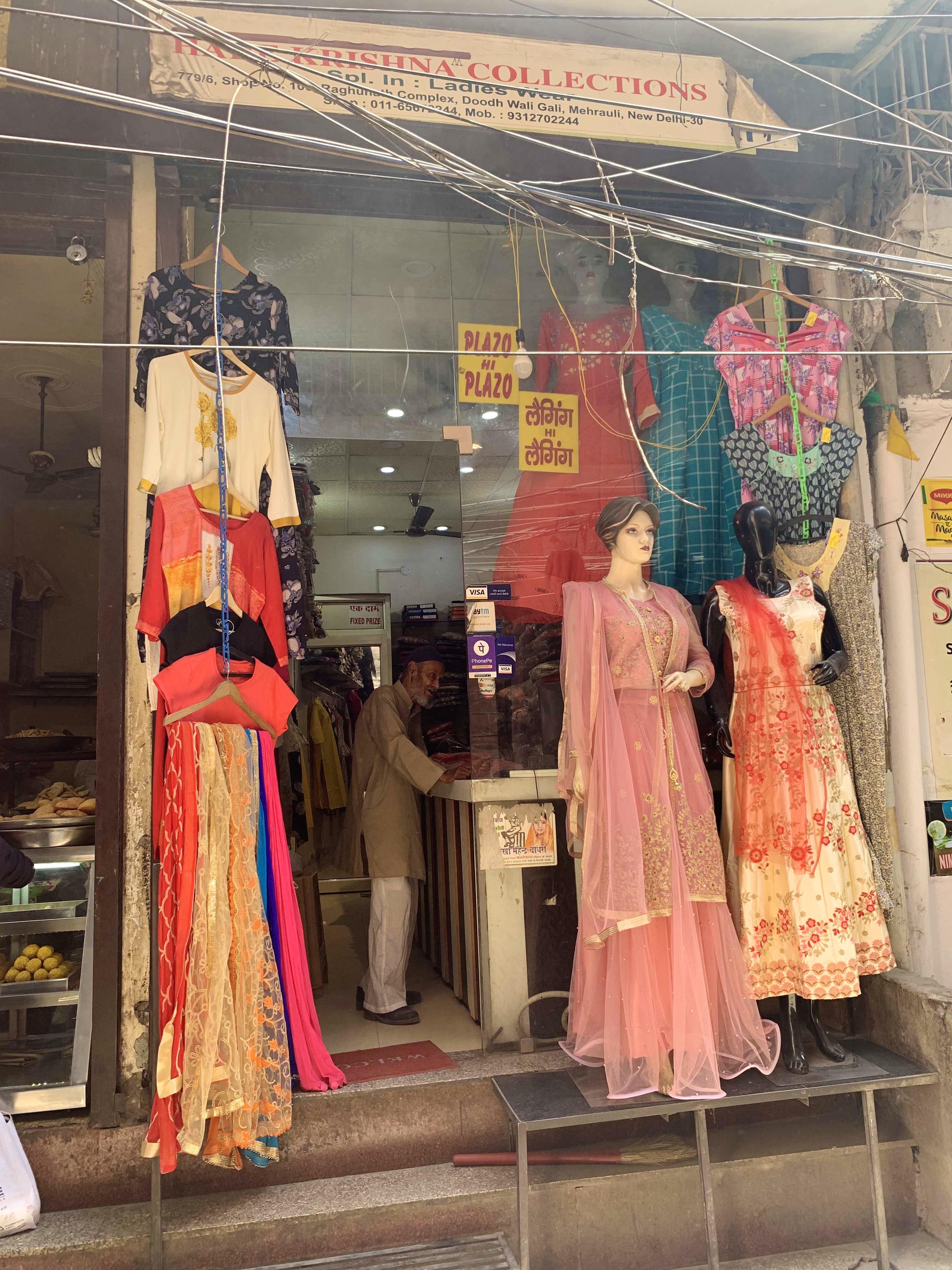 Boutique,Pink,Textile,Display window,Dress,Retail,Room,Temple,Peach,Building