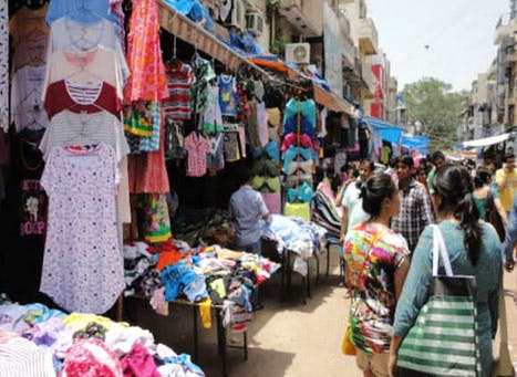 Market,Marketplace,Bazaar,Selling,Public space,Flea market,Human settlement,Stall,City,Shopping