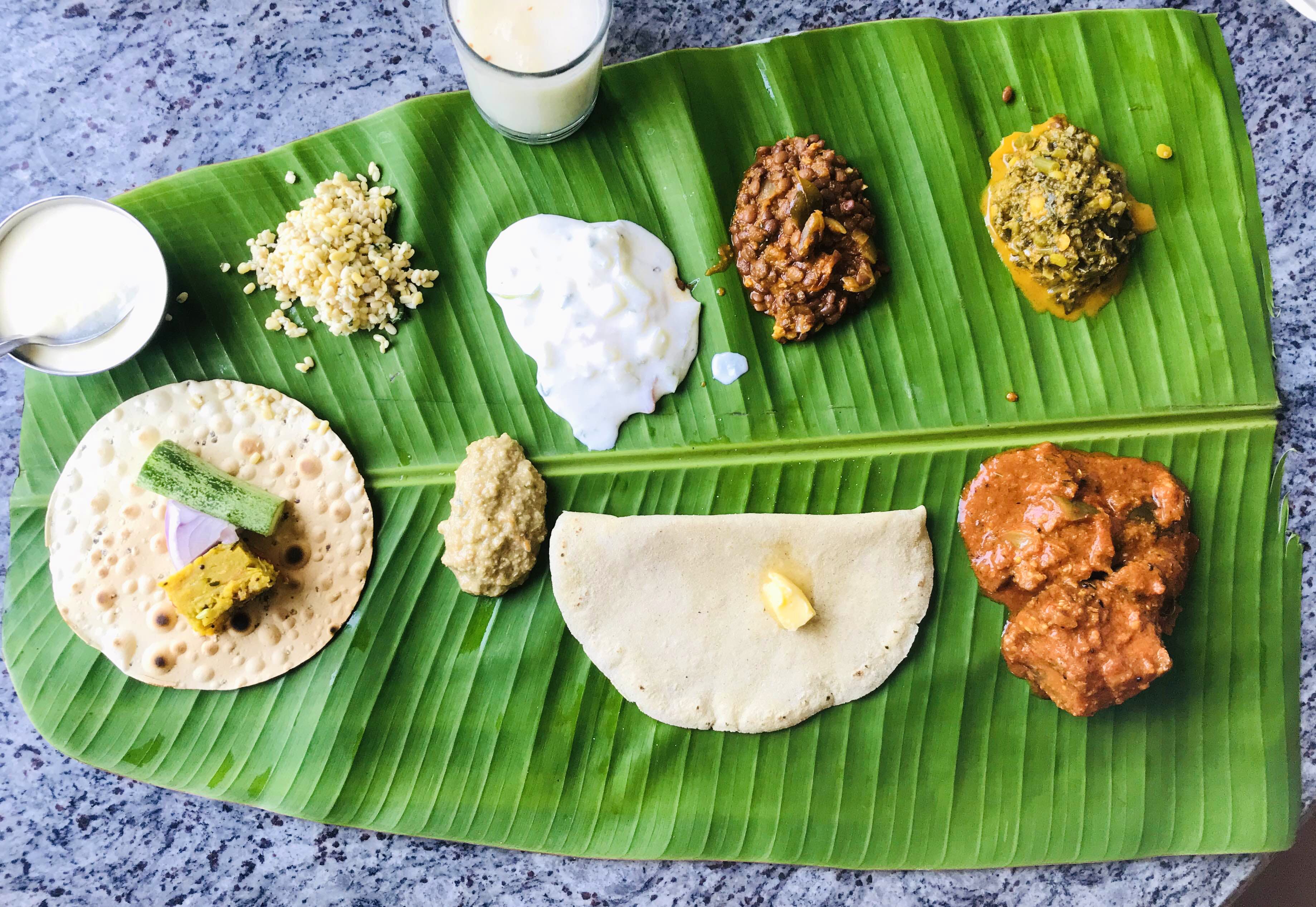 Dish,Food,Cuisine,Sadya,Banana leaf,Leaf,Banana leaf rice,Ingredient,Andhra food,Tamil food
