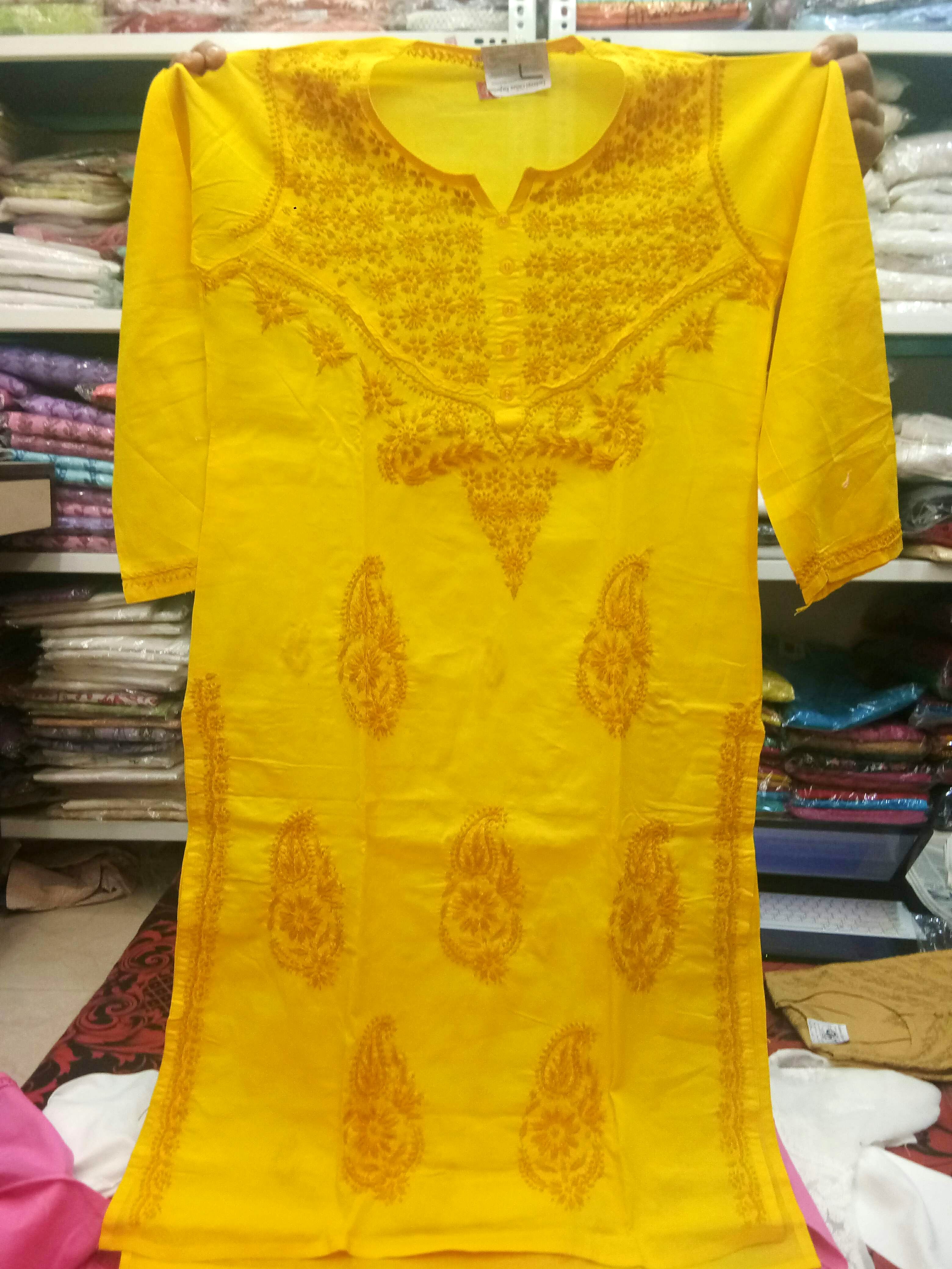 Clothing,Yellow,T-shirt,Textile,Dress,Day dress,Blouse,Embroidery,Sleeve,Pattern