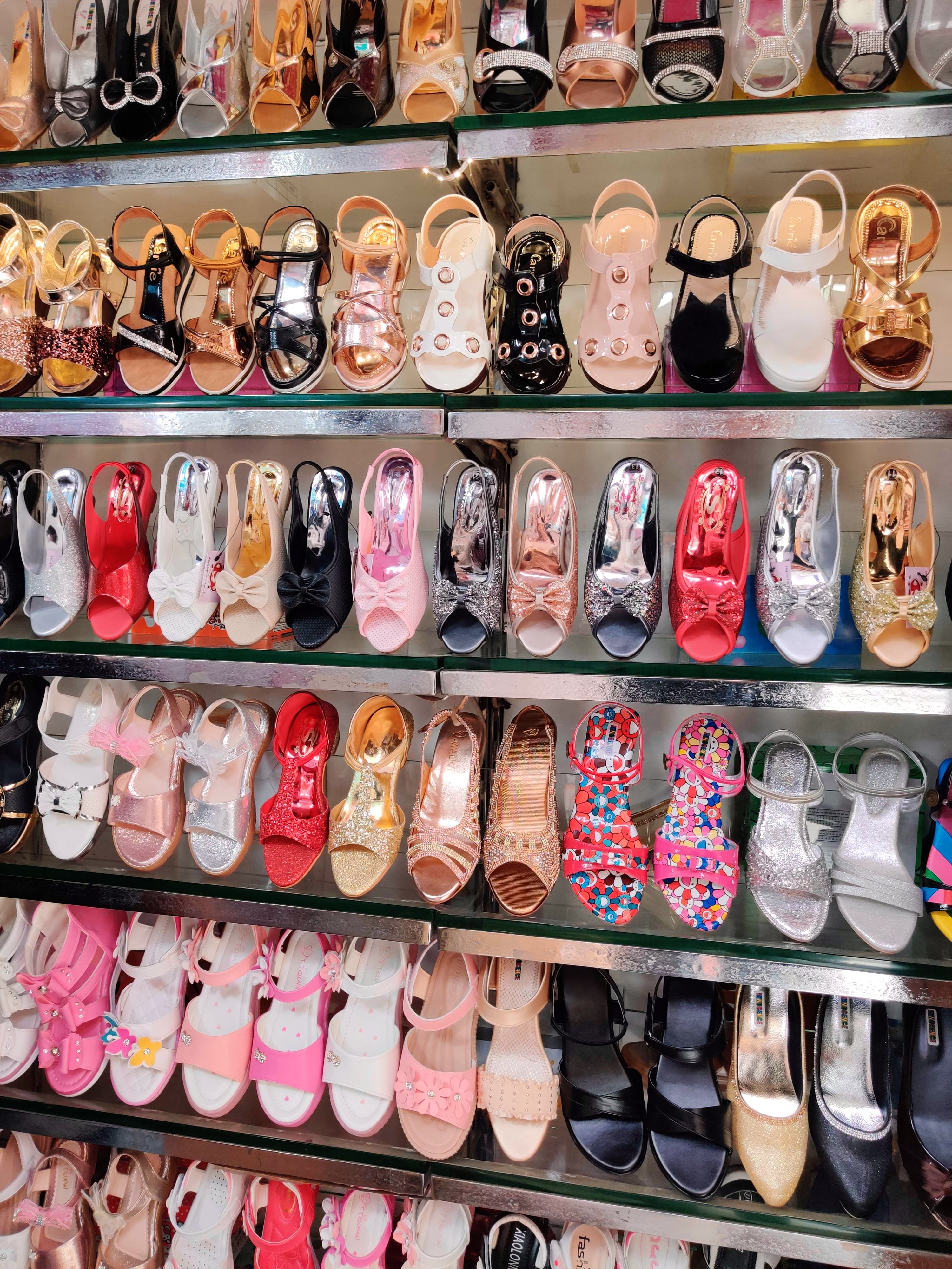 Footwear,Collection,Pink,Shoe,Fashion,Shelf,Shoe store,Athletic shoe