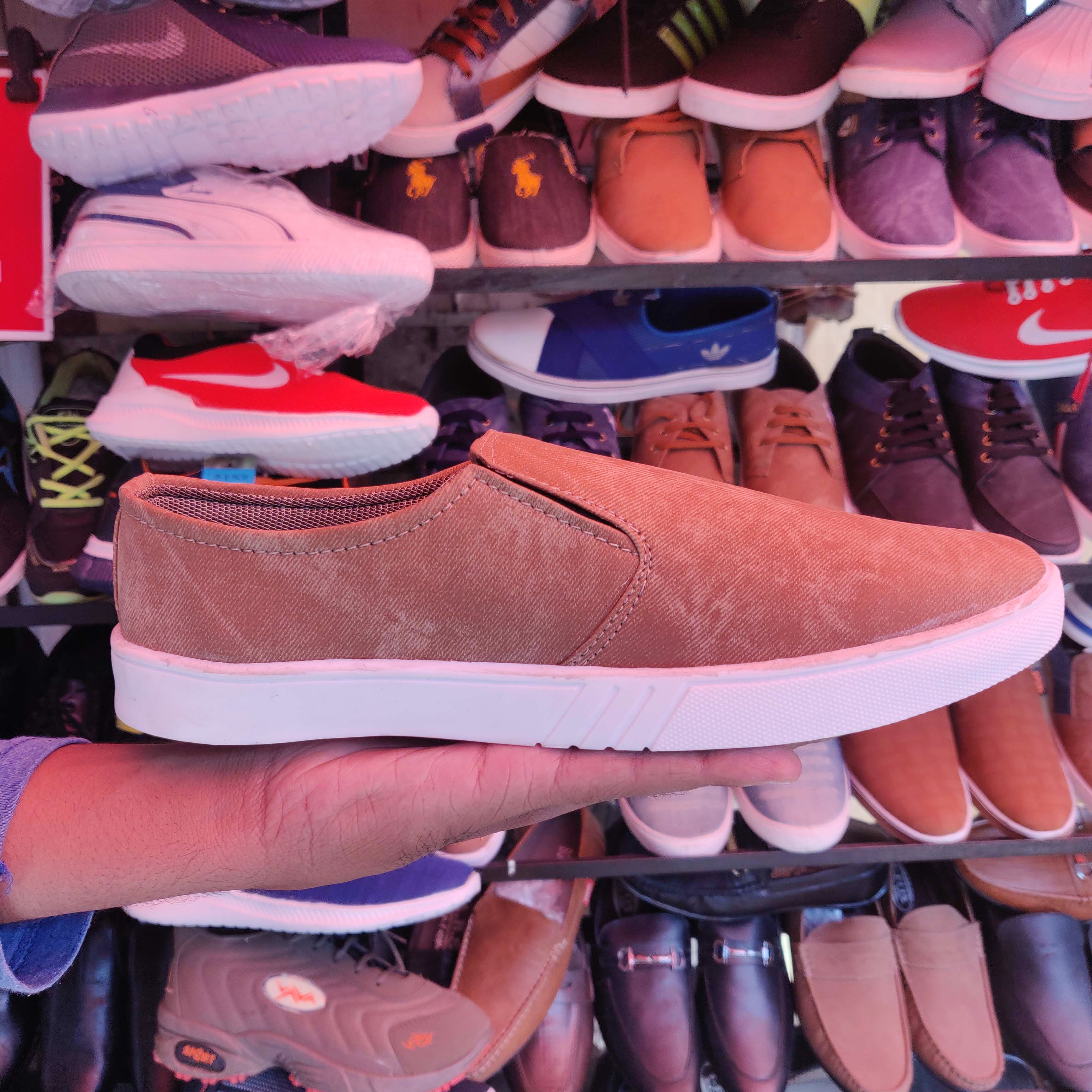 Footwear,Shoe,Shoe store,Sneakers,Athletic shoe,Outdoor shoe