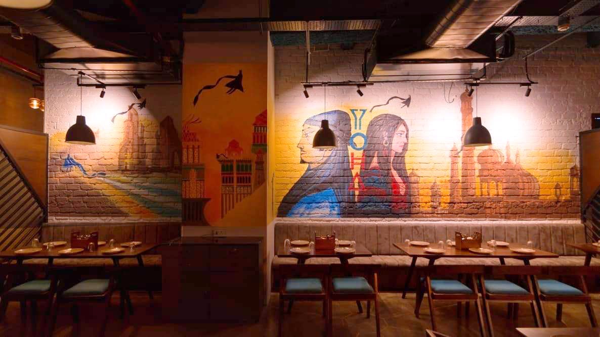 Wall,Architecture,Interior design,Restaurant,Art,Building,Room,Arch,Night,Mural