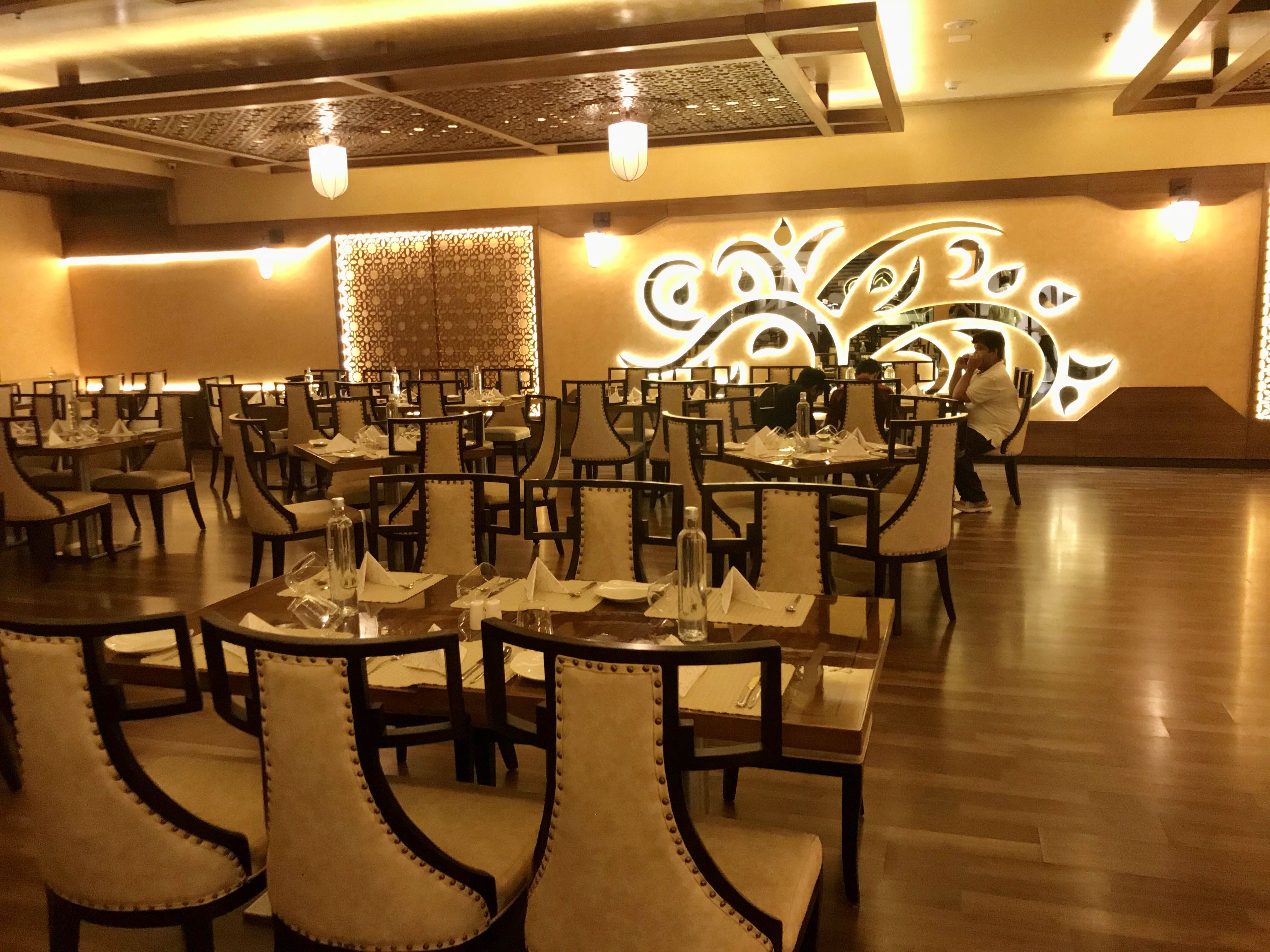 Restaurant,Function hall,Table,Room,Interior design,Building,Dining room,Chair,Kitchen & dining room table,Furniture