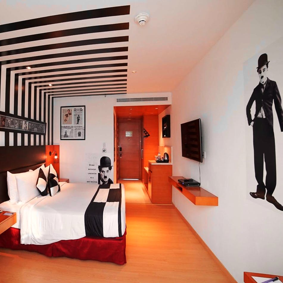 Interior design,Room,Orange,Ceiling,Bedroom,Furniture,Wall,Building,House,Architecture