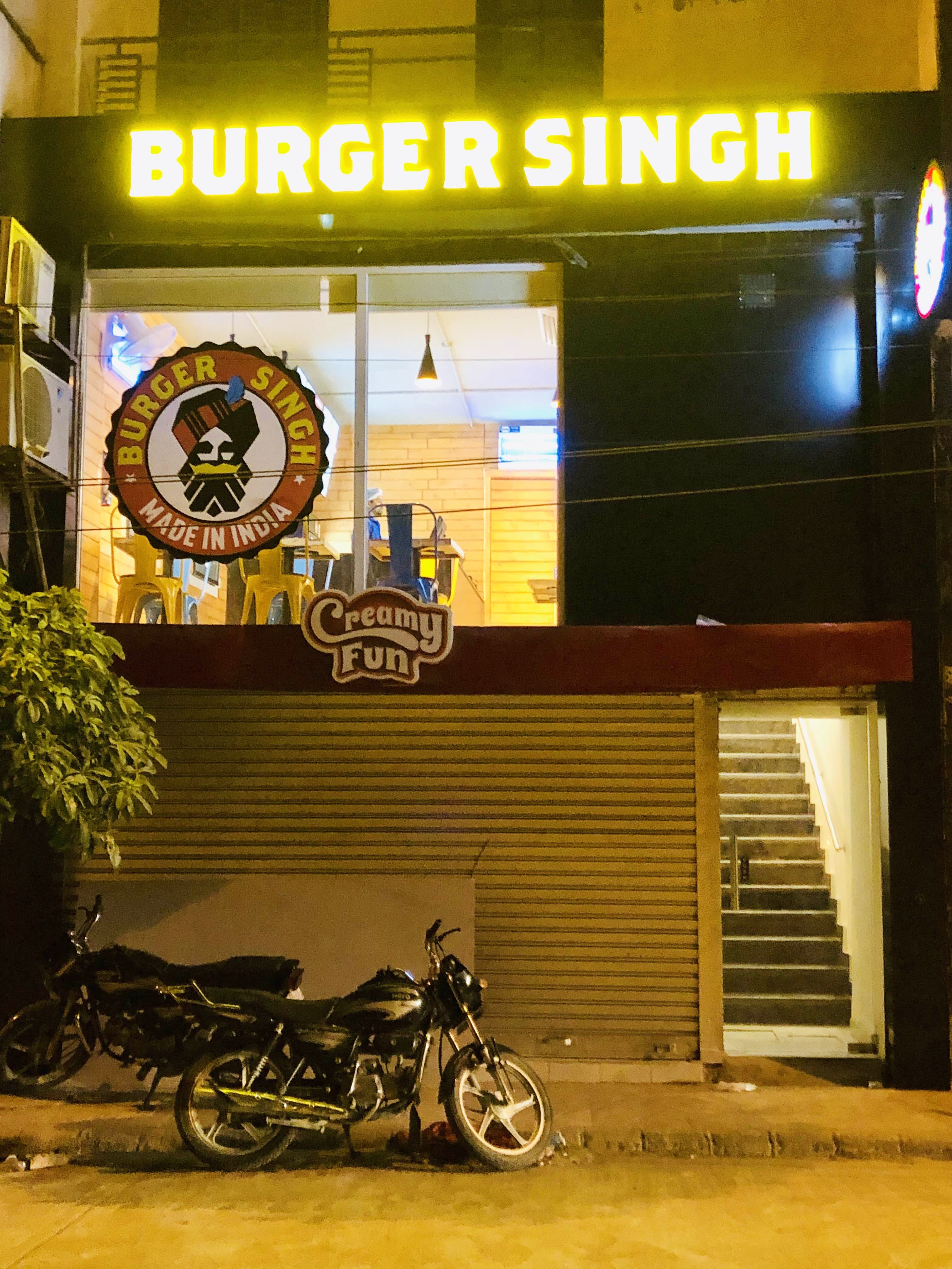 Yellow,Vehicle,Night,Building,Restaurant,Signage