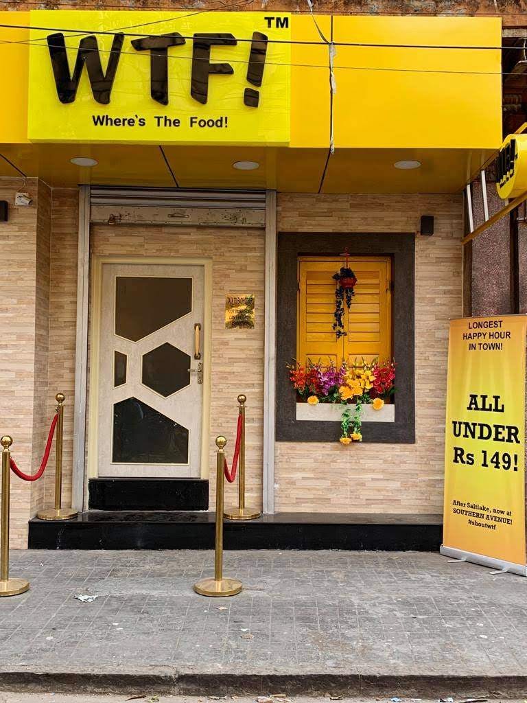 Yellow,Facade,Building,Door,House,Window,Advertising,Signage