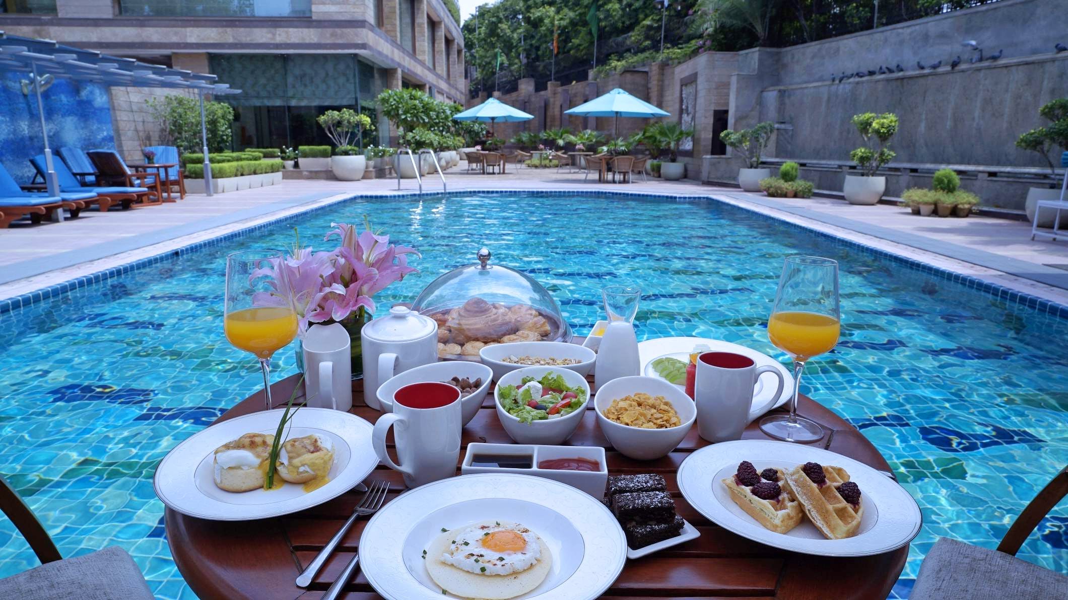 Meal,Brunch,Lunch,Breakfast,Dish,Swimming pool,Food,Resort,Vacation,Leisure