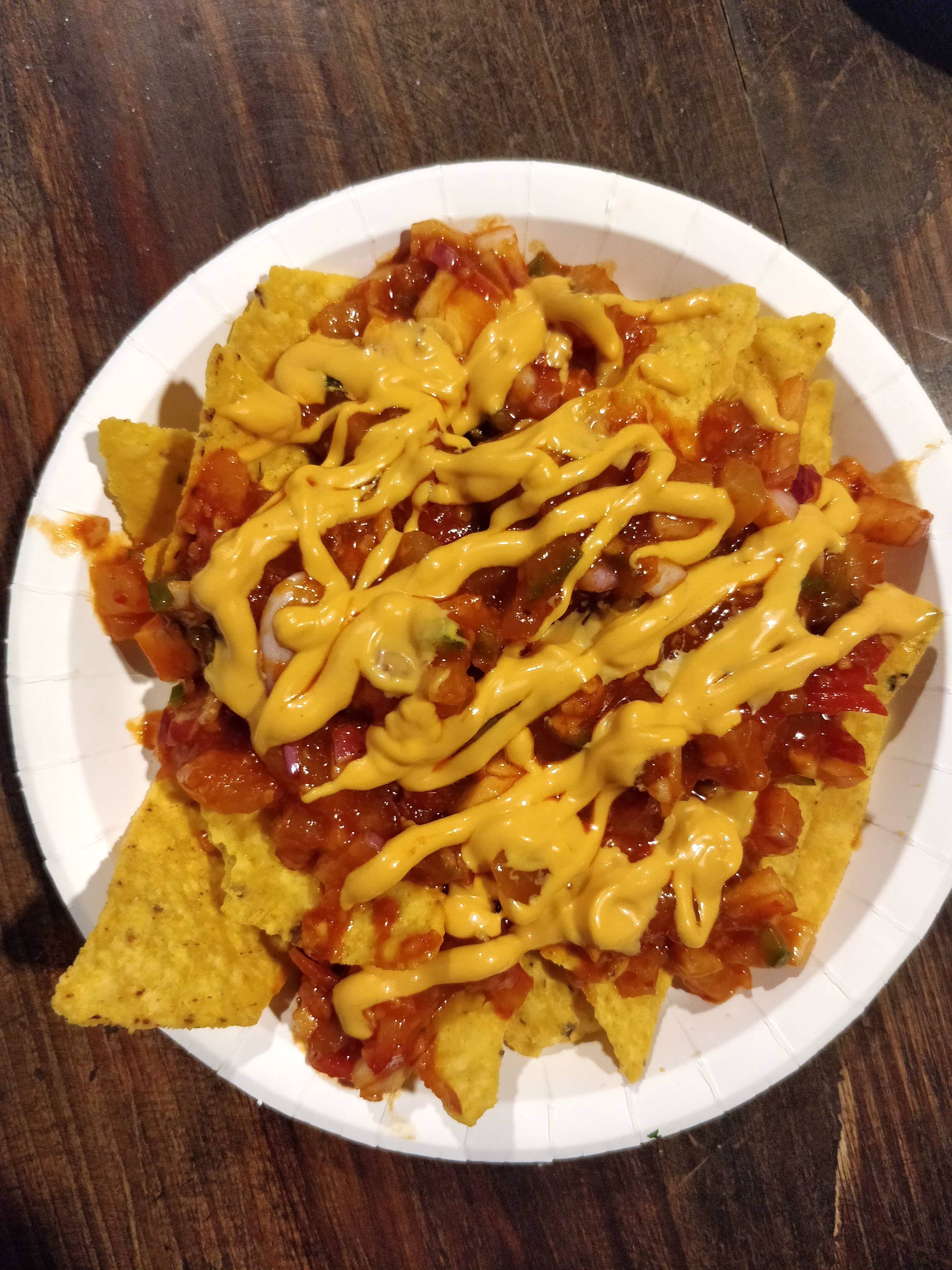 Dish,Food,Cuisine,Ingredient,Nachos,Frito pie,Junk food,Produce,Cheese fries,Meat