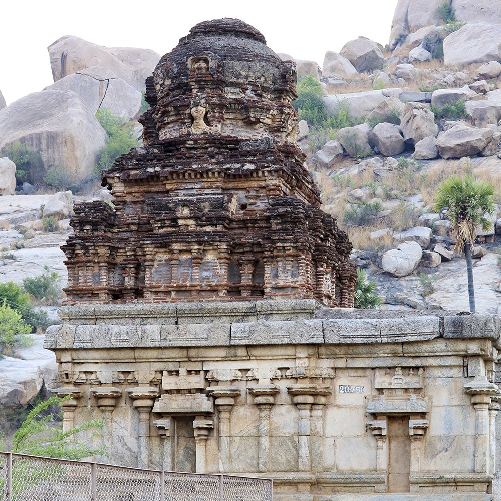 Historic site,Ancient history,Temple,Hindu temple,Stone carving,Ruins,Archaeological site,Carving,Place of worship,Building