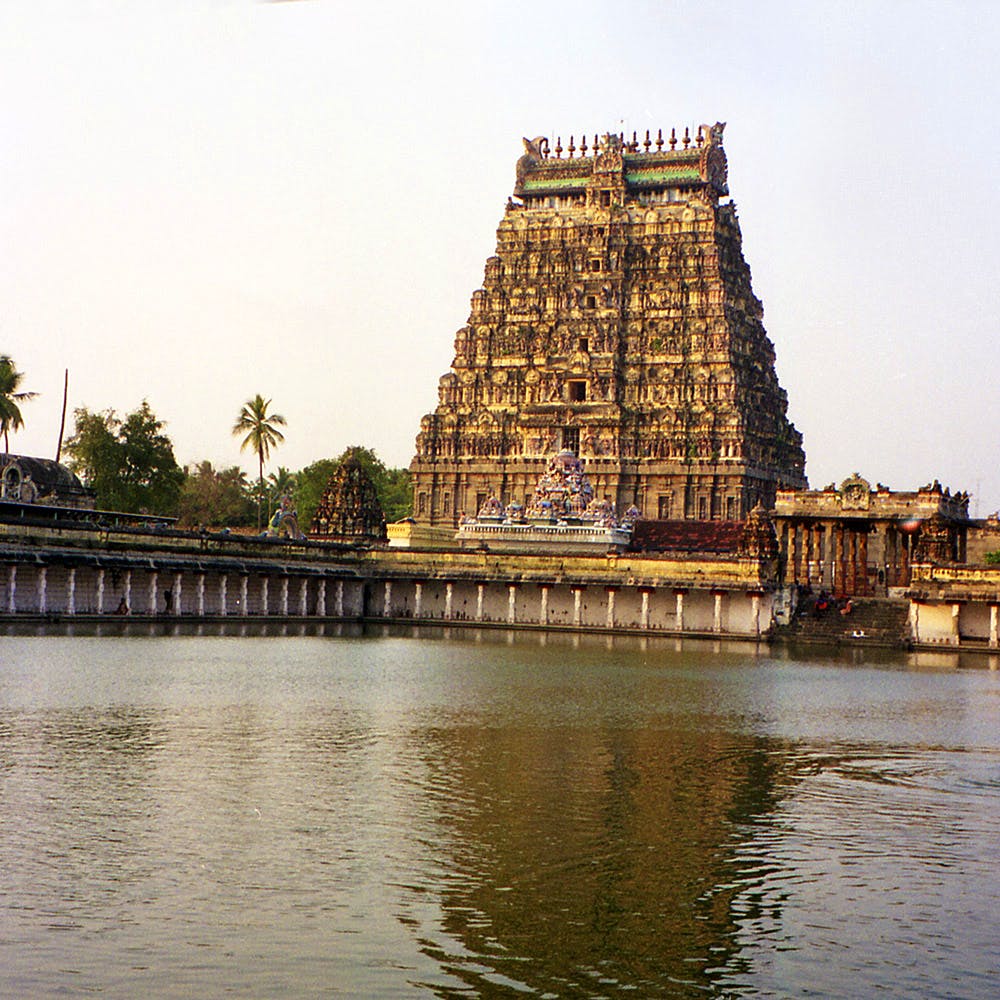 Landmark,Temple,Hindu temple,Architecture,Place of worship,Historic site,Building,Water,Morning,Temple