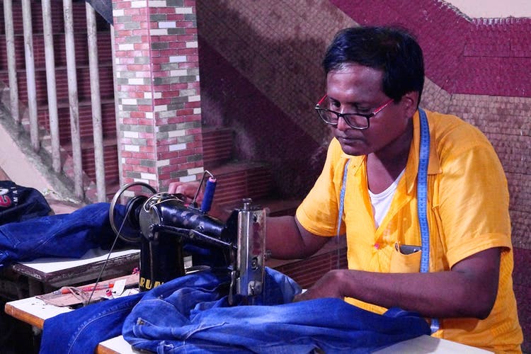 Tailor,Sewing machine,Camera operator